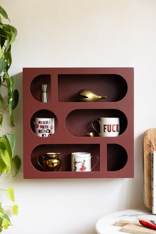 Lifestyle image of the Alcove Wall Shelf in Burgundy
