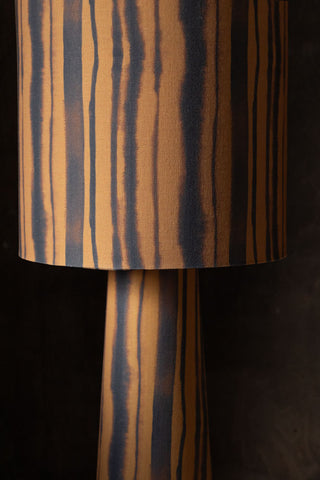 Close-up image of the Amber Blurred Line Print Floor Lamp