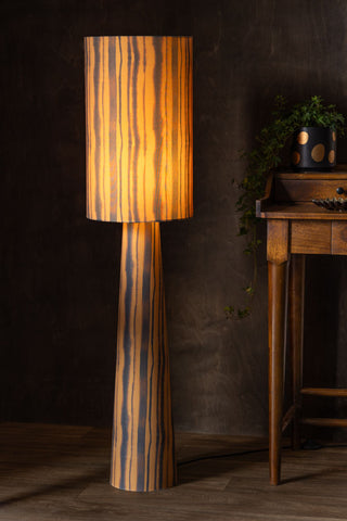 Lifestyle image of the Amber Blurred Line Print Floor Lamp