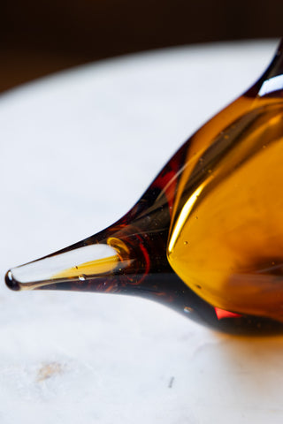 Detail image of the Amber Glass Bird Ornament