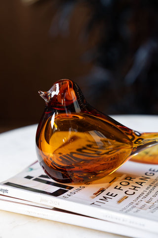 Image of the Amber Glass Bird Ornament on a table
