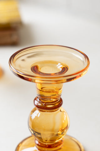 Close-up image of the Amber Glass Candle Holder