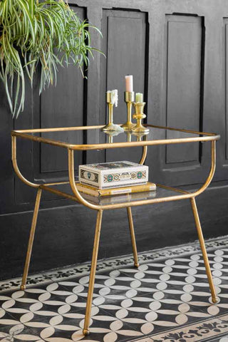 Lifestyle image of the Antique Brass & Glass Side Table