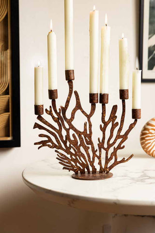 Lifestyle image of the Antique Coral 7 Candle Candelabra