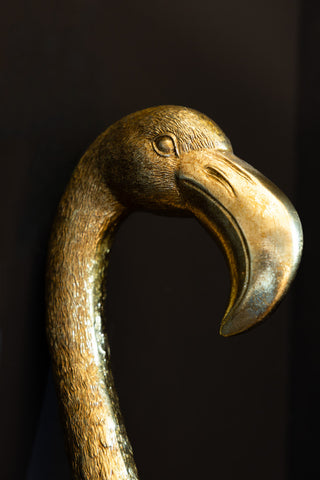 A close up of the face and beak detailing on the Antique Gold Flamingo Head Wall Art