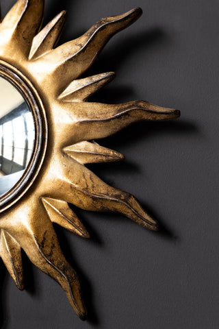 Close-up image of the Antique Gold Sun Convex Mirror