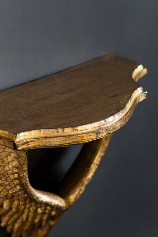 Close-up image of the Antiqued Gold Angel Wings Wall Shelf