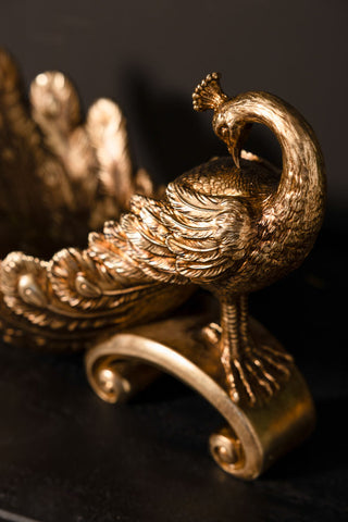 Close-up of the poeacock on the Antique-Style Gold Peacock Decorative Display Bowl.