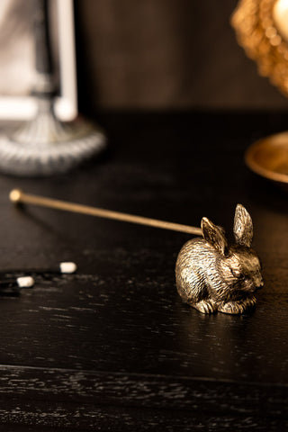 Close-up image of the Antiqued-Gold Rabbit Candle Snuffer