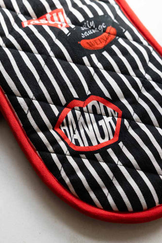 Close-up of the motifs on the Badge Patch Oven Gloves.