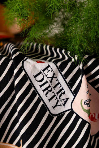 Close-up of the design of the Badge Patch Tea Towel.