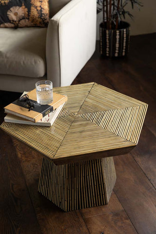 Bamboo inlay hexagon coffee table on wooden floor with white sofa
