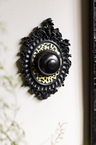 Lifestyle image of the Baroque Bell Wall Decor