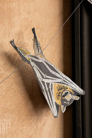 One of the bat designs in the Bats Sewn Paper Halloween Garland.