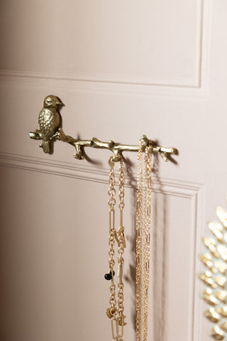 Lifestyle image of the Beautiful Gold Bird Wall Hook