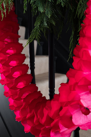 Close-up image of the Beautiful Handcrafted Classic Paper Garland in Bright Red