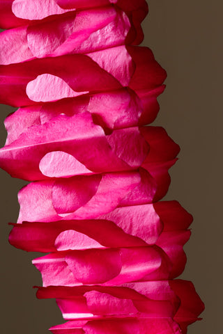 Close-up detail of the Beautiful Handcrafted Classic Paper Garland in Bright Red. 