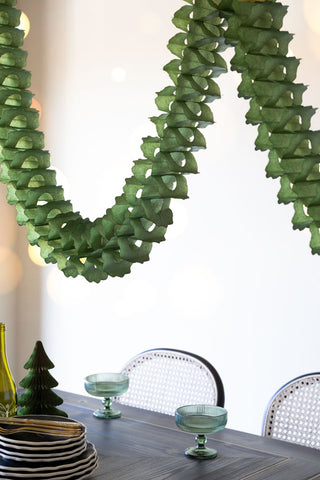 Lifestyle image of the Beautiful Handcrafted Classic Paper Garland in Moss Green
