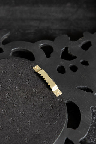 The back fixing on the Beautiful Ornate Black Wall Mirror. 