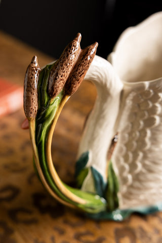 Close-up of the handle of the Beautiful Painted Swan Jug.