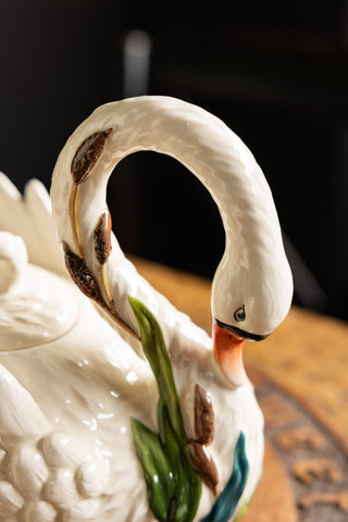 Close-up of the face/handle of the Beautiful Painted Swan Teapot.