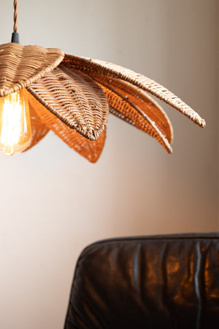 Image of the Beautiful Rattan Flower Easyfit Shade with the bulb turned on