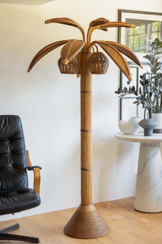Lifestyle image of the Beautiful Rattan Palm Tree Floor Lamp