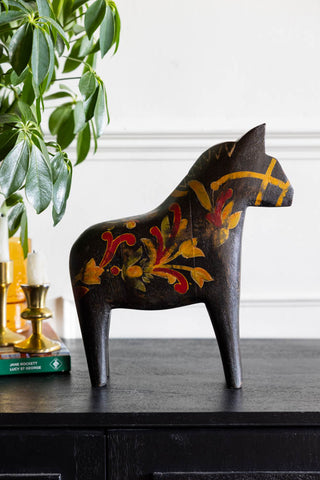 Image of the Beautiful Swedish Horse Ornament on a sideboard