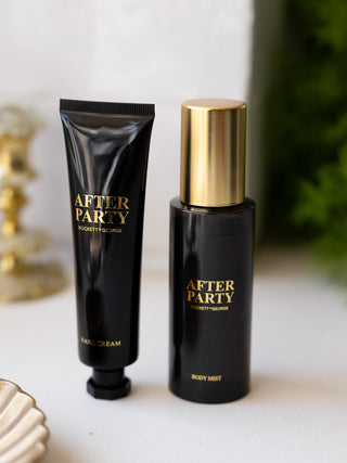 The contents of the After Party Hand & Body Beauty Cracker, displayed on a white surface with some other accessories.