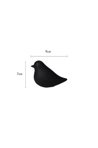 Cutout image of Bobby The Black Bird Ornament on a white background with dimension details. 