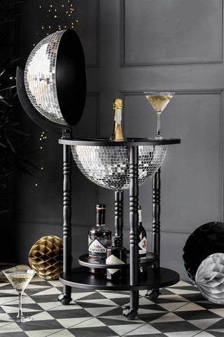 Image of the silver disco trolley with an open top revealing storage space for glassware and bottles.