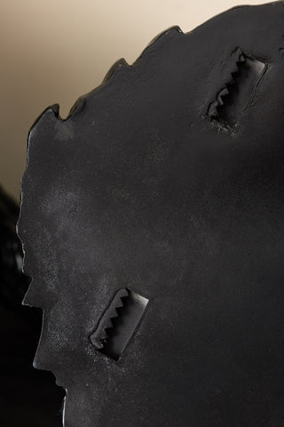 Close-up of the fixings on the back of the Black & Gold Peacock Wall Art.