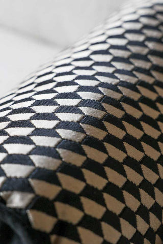 Close-up image of the Black Geo Bolster Cushion.