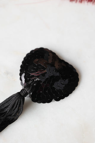 Close-up image of the Black Heart Sequin Nipple Tassels