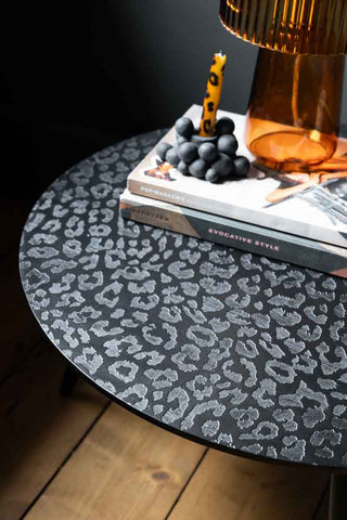 Close-up image of the Black Leopard Love Coffee Table