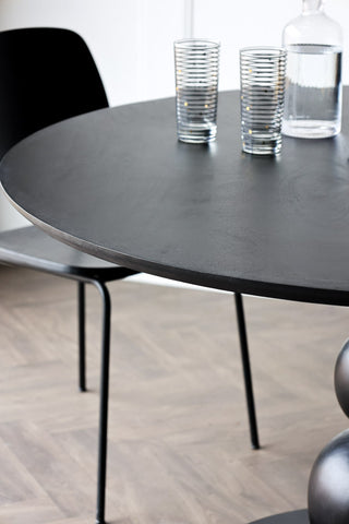 Detail image of the Black Mango Wood Round Dining Table