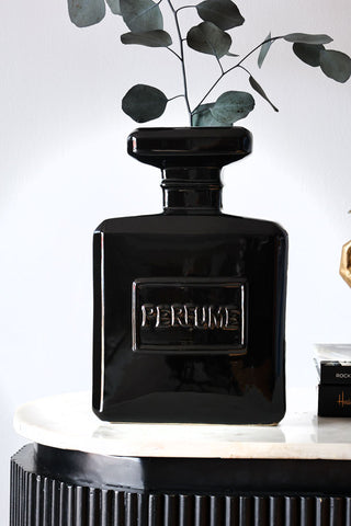 Lifestyle image of the Black Perfume Bottle Vase