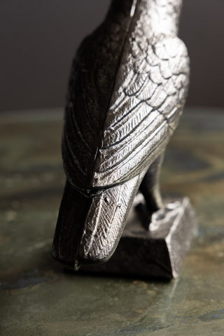 Close-up of the back of the Black Raven Cast Iron Doorstop.