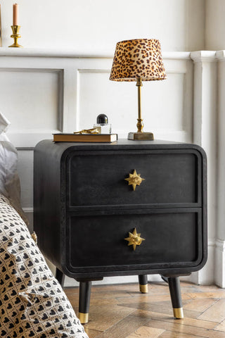 Lifestyle image of the Black Ringo Bedside Table