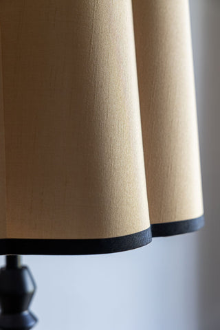 Image of the finish for the Black Spindle Floor Lamp With Scalloped Shade