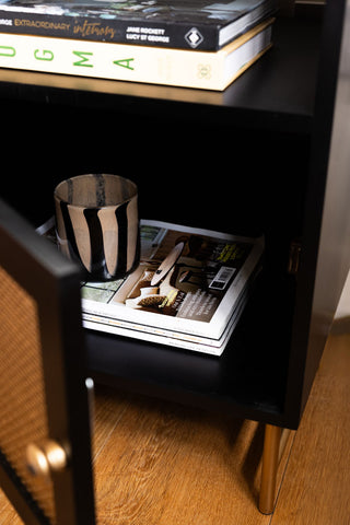 Image of the inside of the Black & Gold Rattan Bedside Table