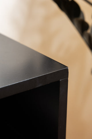 Image of the finish on the Black & Gold Rattan Bedside Table