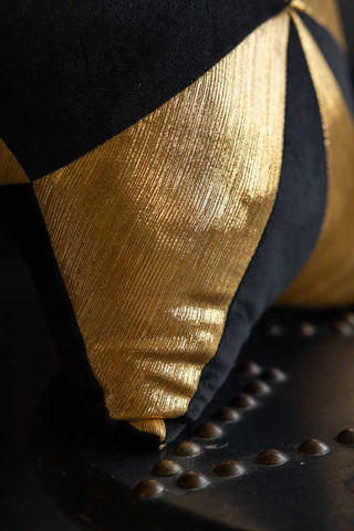 Close-up image of the Black & Gold Star Cushion