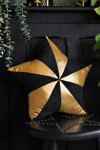 Lifestyle image of the Black & Gold Star Cushion