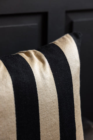 Close up detail of the Black & Gold Stripe Cushion Cover. 