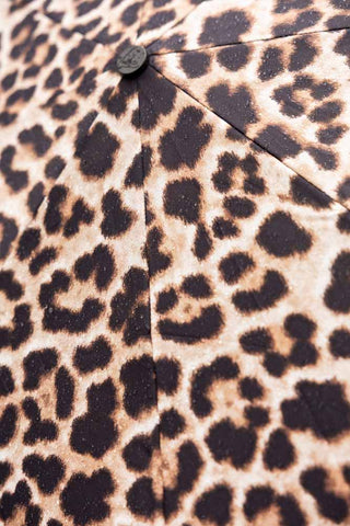 The leopard lining of the Black & Leopard Print Umbrella.