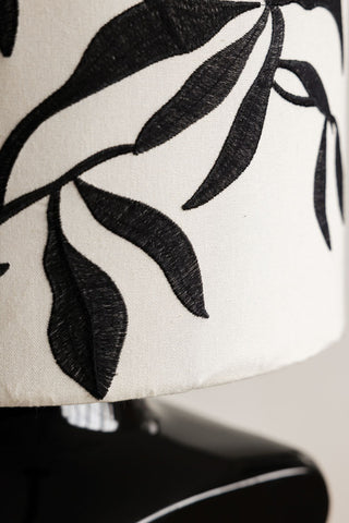 Close-up image of the Black & White Floral Silhouette Floor Lamp
