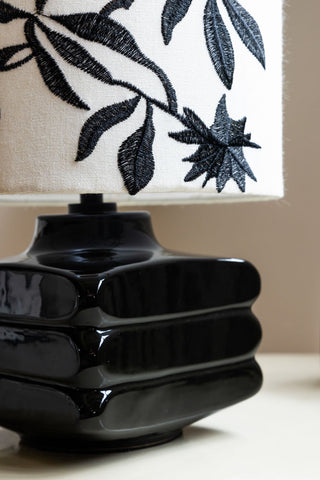 Close-up image of the Black & White Floral Silhouette Table Lamp