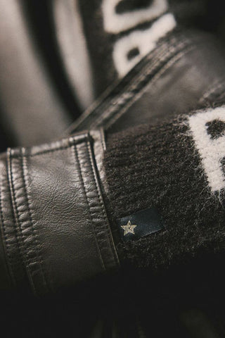 Close-up of the star design on the Black & White Rock 'N' Roll Handwarmers.