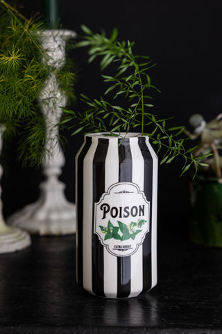 Lifestyle image of the Black & White Stripe Poison Can Display Ornament